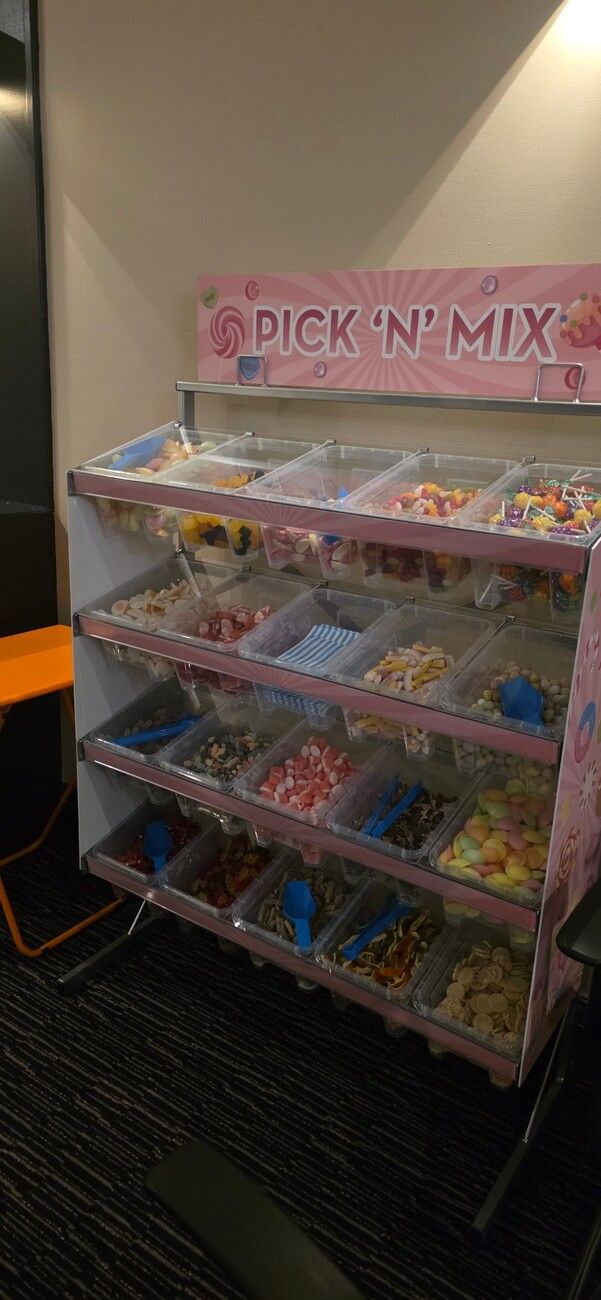 Our pick n mix stand stocked with sweets, scoops and bags at Chessington World of Adventures