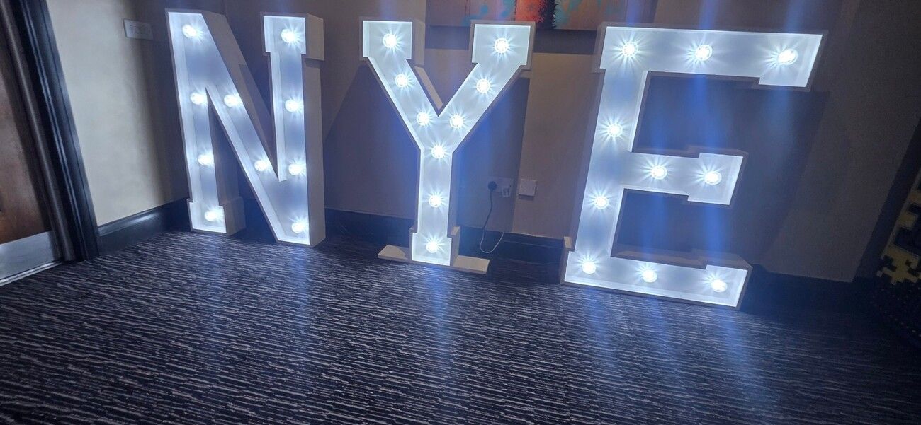 Our giant light-up N, Y and E letters set up at Chessington World of Adventures