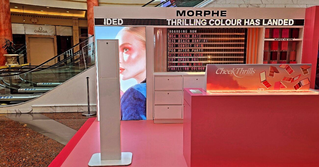 Our Selfie Pod with the boarding board and Cheek Thrills counter at the Manchester pop-up