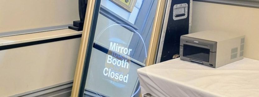 A magic mirror photo booth at a corporate Christmas party at Oatlands Park Hotel