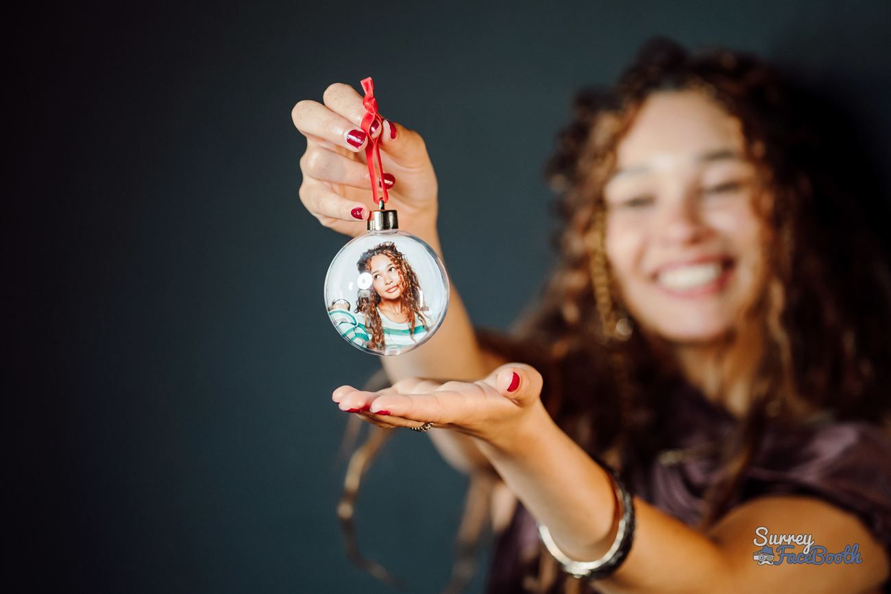 Photo Bauble Guest Holding Personalised Bauble Red Ribbon