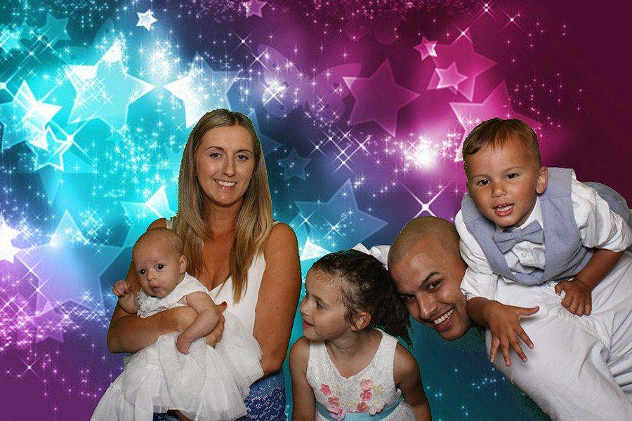 The family behind Surrey FaceBooth in a photo booth picture