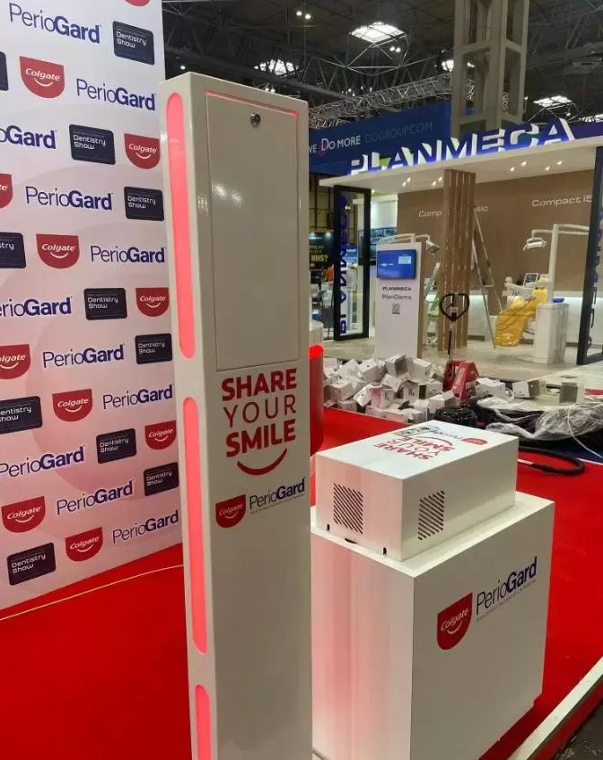 PerioGard — blue floor-mounted totem booth at a trade show
