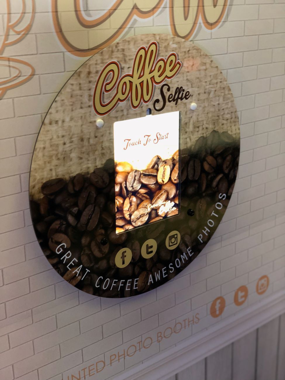 Coffee Selfie — wall-mounted booth with custom coffee branding