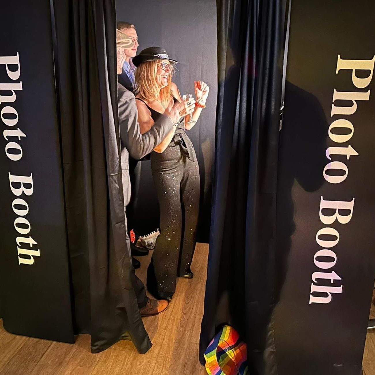 Party Booth Photo Booth Guests Inside Laughing With Champagne