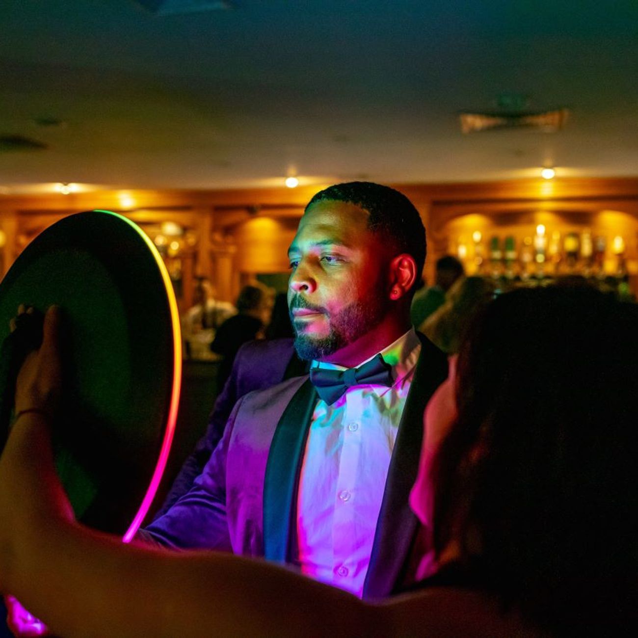 Ring Roamer Tuxedo Guest Posing Bar Venue