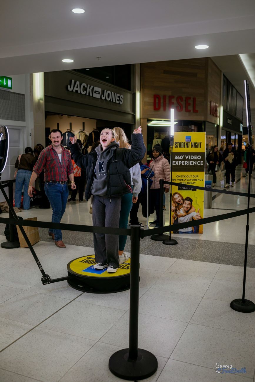 360 video booth brand activation at a shopping centre with stanchion queue and event signage