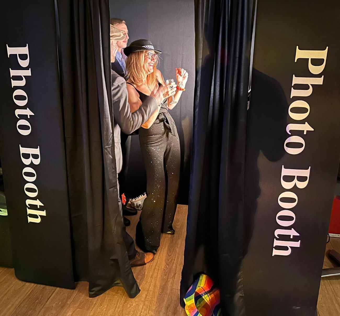 Party Booth Photo Booth Guests Inside Laughing With Champagne