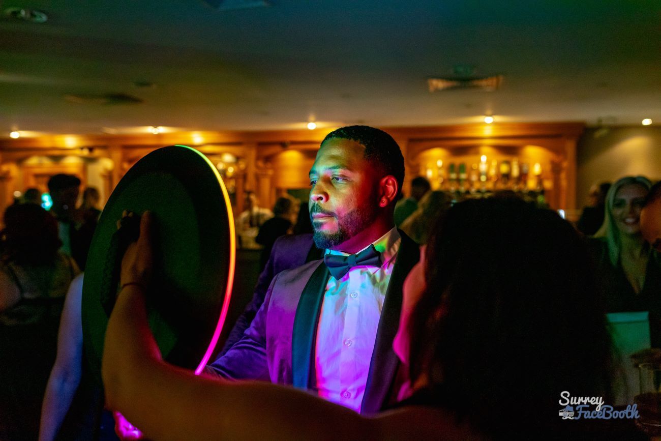 Ring Roamer Tuxedo Guest Posing Bar Venue